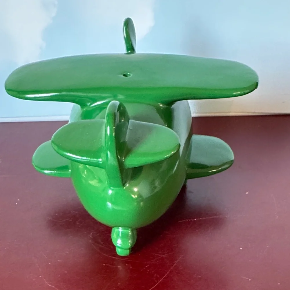 Vintage Green piggy bank Airplane